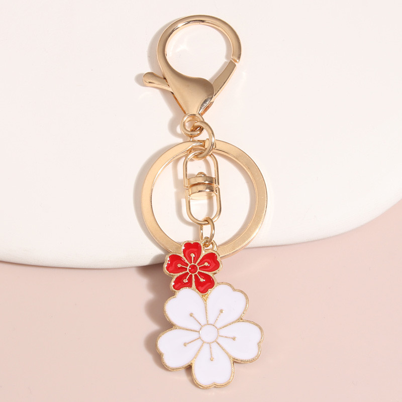 Breloc drăguț cu flori de Sakura Breloc emailat pentru femei, fete, accesoriu pentru geantă, pentru agățat mașină, cadou de bijuterii lucrate manual