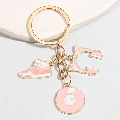 Roztomilý smaltovaný prívesok na kľúče Športová obuv Record Cat Headset Keyring Kľúčenka s mikrofónom Kľúčenky pre ženy Muži DIY Ručne vyrobené šperky Darčeky