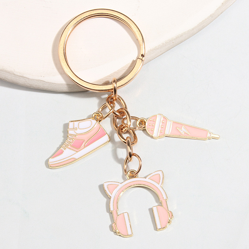 Roztomilý smaltovaný prívesok na kľúče Športová obuv Record Cat Headset Keyring Kľúčenka s mikrofónom Kľúčenky pre ženy Muži DIY Ručne vyrobené šperky Darčeky