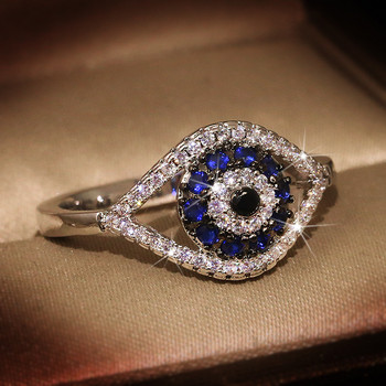 НОВ Пънк женски пръстен със син кристален камък Шарм Циркон Сребърен цвят Сватбени бижута за жени Изящен годеж с кухи очи Evil Eye