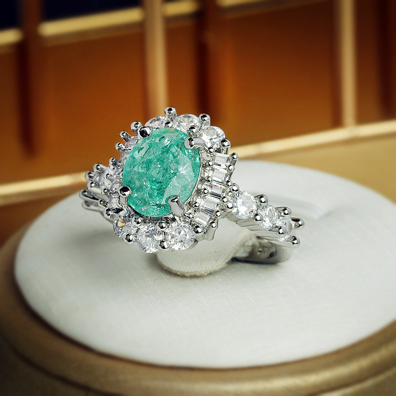 Luksuslik Paraiba safiirist ovaalne täisteemantpaarisõrmus naistele Eomeetrilise tsirkooniumoksiidiga sõbrapäeva kingituste ehete hulgimüük