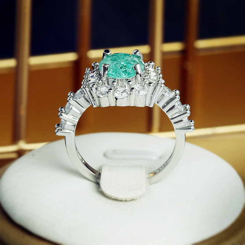 Luksuslik Paraiba safiirist ovaalne täisteemantpaarisõrmus naistele Eomeetrilise tsirkooniumoksiidiga sõbrapäeva kingituste ehete hulgimüük