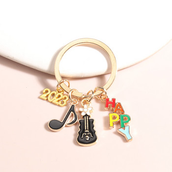 Χαριτωμένο μπρελόκ με σμάλτο 2023 Music Note Flower κιθάρα Happy Ring Μουσικά όργανα Μπρελόκ για γυναίκες Ανδρικά δώρα κοσμήματα
