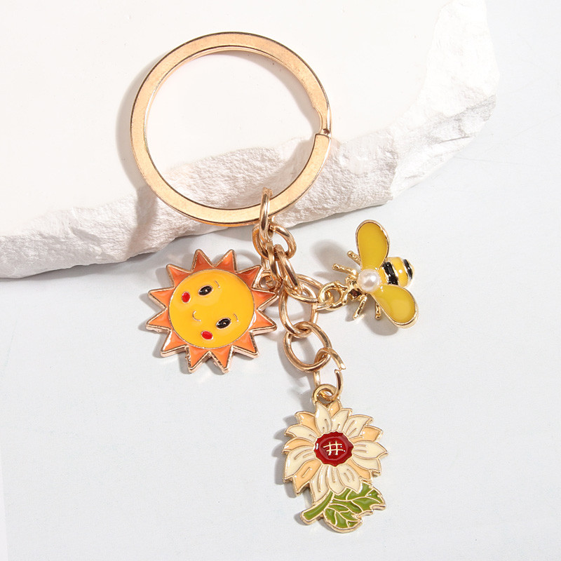 Crtani privjesak za ključeve Suncokret Medonosna pčela Sunce privjesak za ključeve Emajlirani privjesci za ključeve Suveniri Pokloni za žene Muškarci Dodaci za torbice DIY nakit