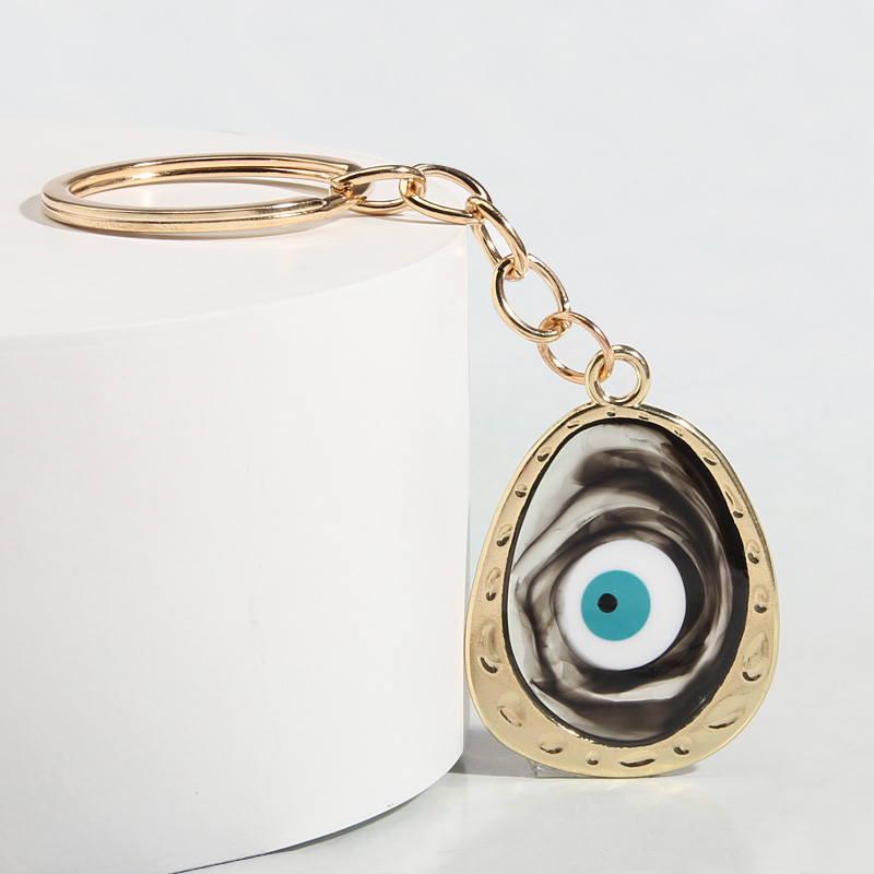 Novi privjesak za ključeve Okrugli privjesak za ključeve Ovalni oblik Privjesci za ključeve Suveniri Pokloni za žene Muškarci Dodaci za torbice Ključevi automobila Punk nakit