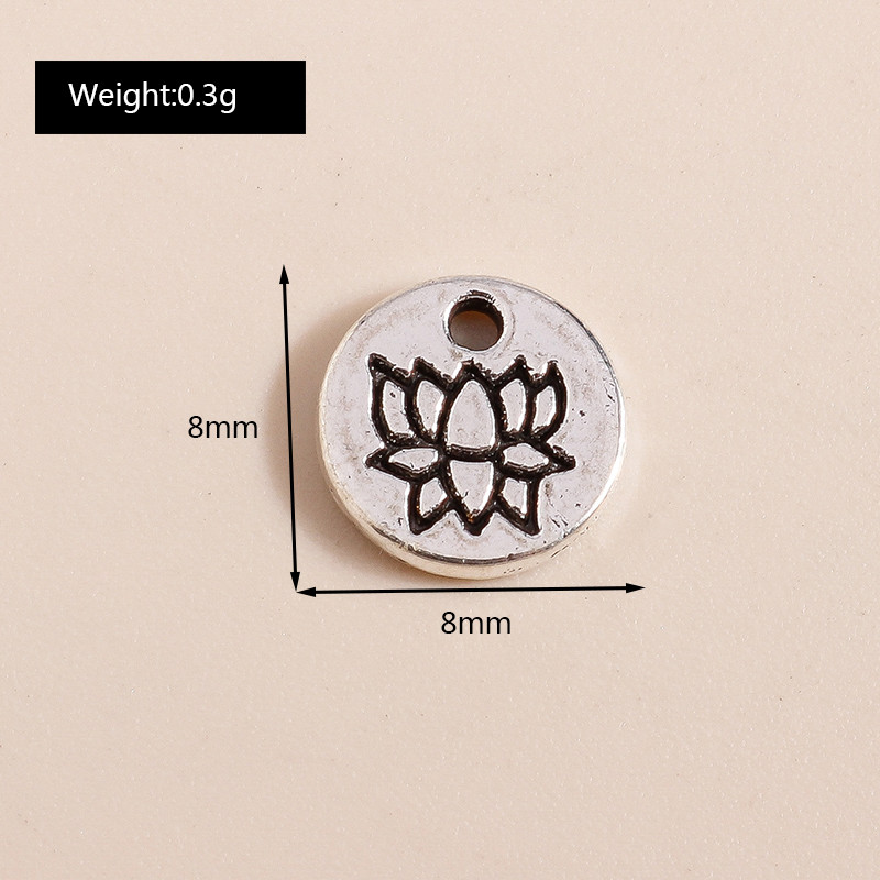 80 bucăți 8 * 8mm mic Yoga Om Meditație Lotus Brelocuri Antique Placate cu argint Pandantive cu flori pentru fabricarea manuală de bijuterii DIY
