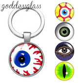 Dragon eye pepple eye pupilla Új stílusú Kerek üveg cabochon kulcstartó Táska Autós kulcstartó Gyűrűtartó Charms kulcstartók ajándékokhoz
