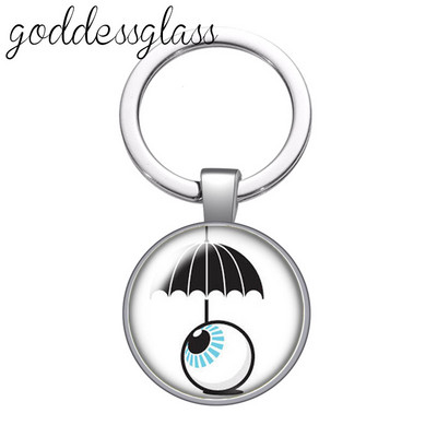 Dragon eye pepple eye pupilla Új stílusú Kerek üveg cabochon kulcstartó Táska Autós kulcstartó Gyűrűtartó Charms kulcstartók ajándékokhoz