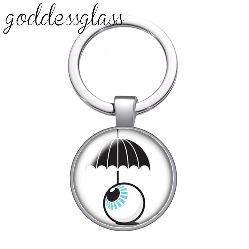 Dragon eye pepple eye pupilla Új stílusú Kerek üveg cabochon kulcstartó Táska Autós kulcstartó Gyűrűtartó Charms kulcstartók ajándékokhoz