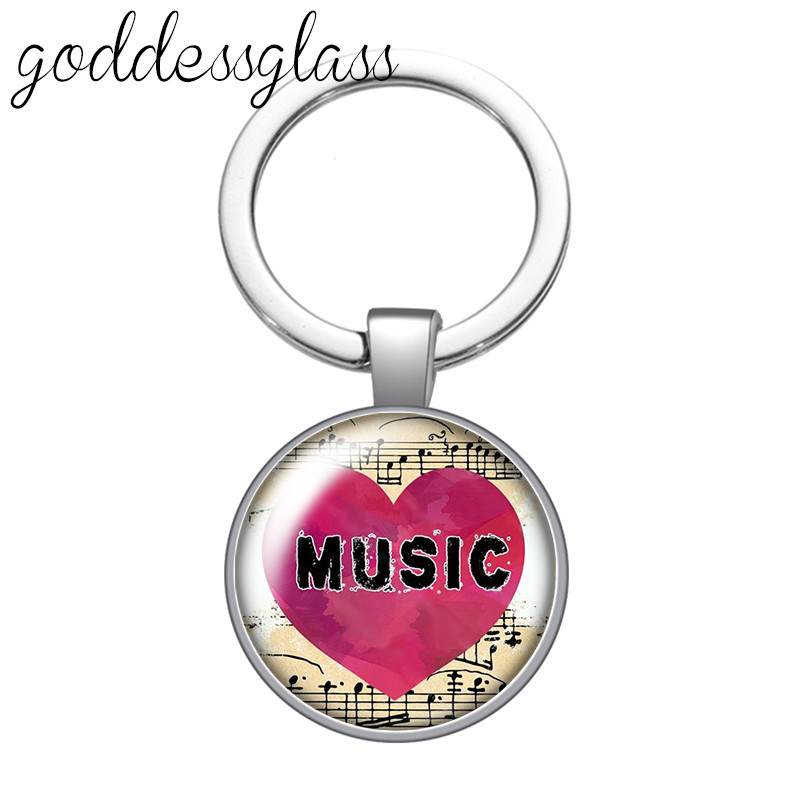 Love Music Guitar Notes hangszerek 25 mm-es üveg cabochon kulcstartó Táska Autós kulcstartó Gyűrűtartó Charms kulcstartók ajándék
