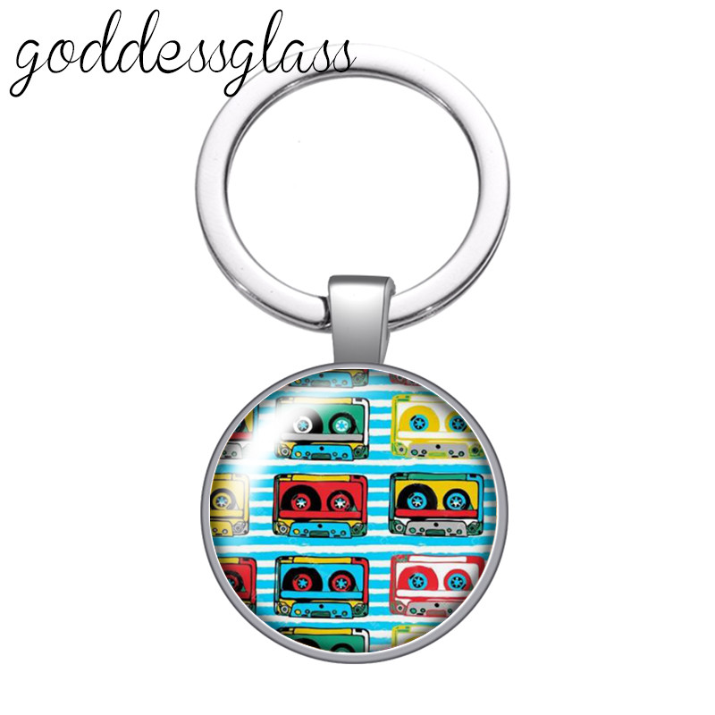 Love Music Guitar Notes hangszerek 25 mm-es üveg cabochon kulcstartó Táska Autós kulcstartó Gyűrűtartó Charms kulcstartók ajándék