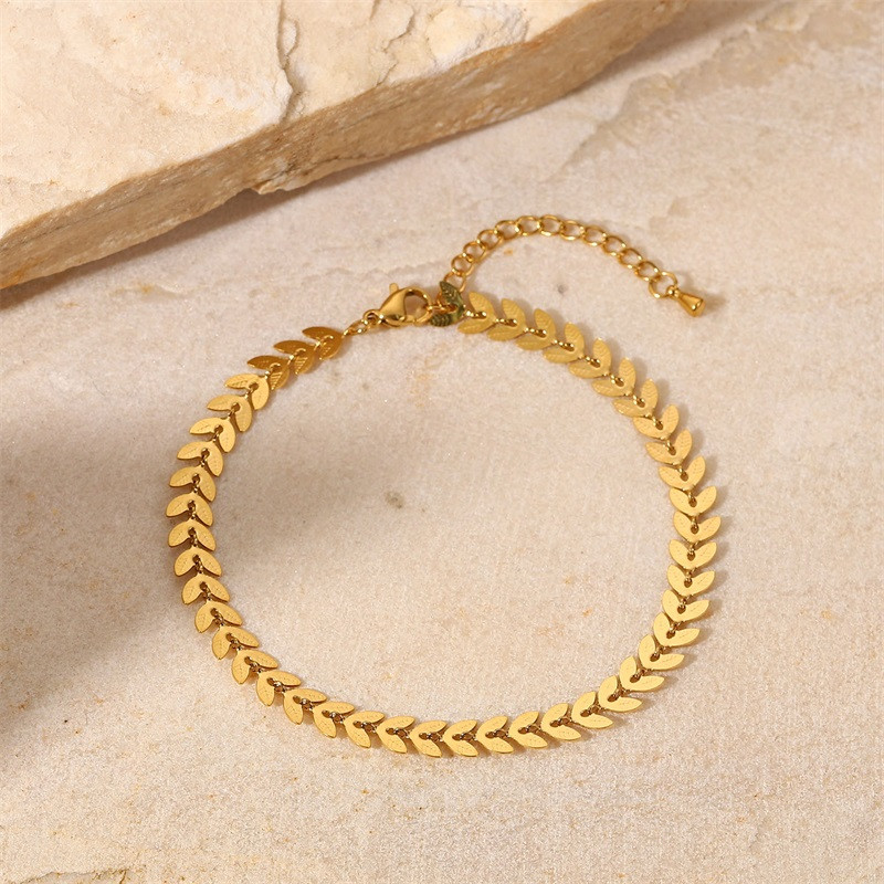 Arany rozsdamentes acél Stílusos tengerparti szél levél nyílmintás bokalánc 18K Aranyozott PVD Metallic Feel vízálló party ajándék