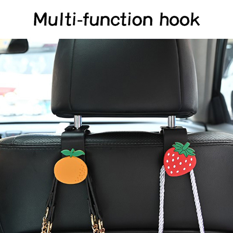 1 tk uhiuus ja kvaliteetne multikas armas auto tagaistme tagaistme tagaistme konks Creative auto interjööri hoiukonks