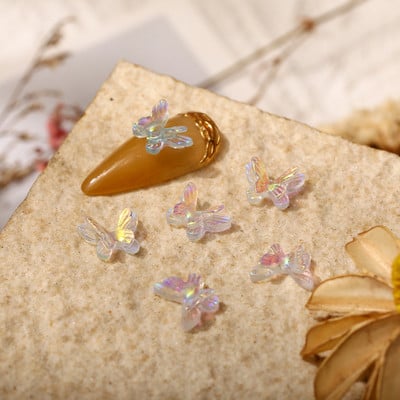 50 бр. Двоен нокът Aurora Bowknot орнаменти Aurora иридесценция AB смола покритие цветно стерео прозрачно свредло за нокти