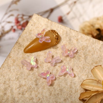 50 бр. Двоен нокът Aurora Bowknot орнаменти Aurora иридесценция AB смола покритие цветно стерео прозрачно свредло за нокти