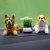 Baba bólogató kutya rázó fej gyanta szimuláció autó aranyos kutya dekoráció dísz autó műszerfal kiegészítők