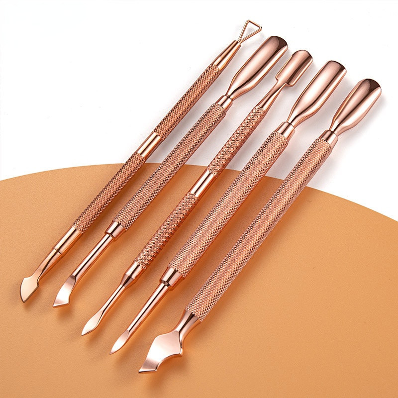 Új rozsdamentes acél Rose Gold Kétfejű Steel Pusher Dead Skin Olló Lakk Gél eltávolító Manikűr Pedikűr Körömápoló eszközök