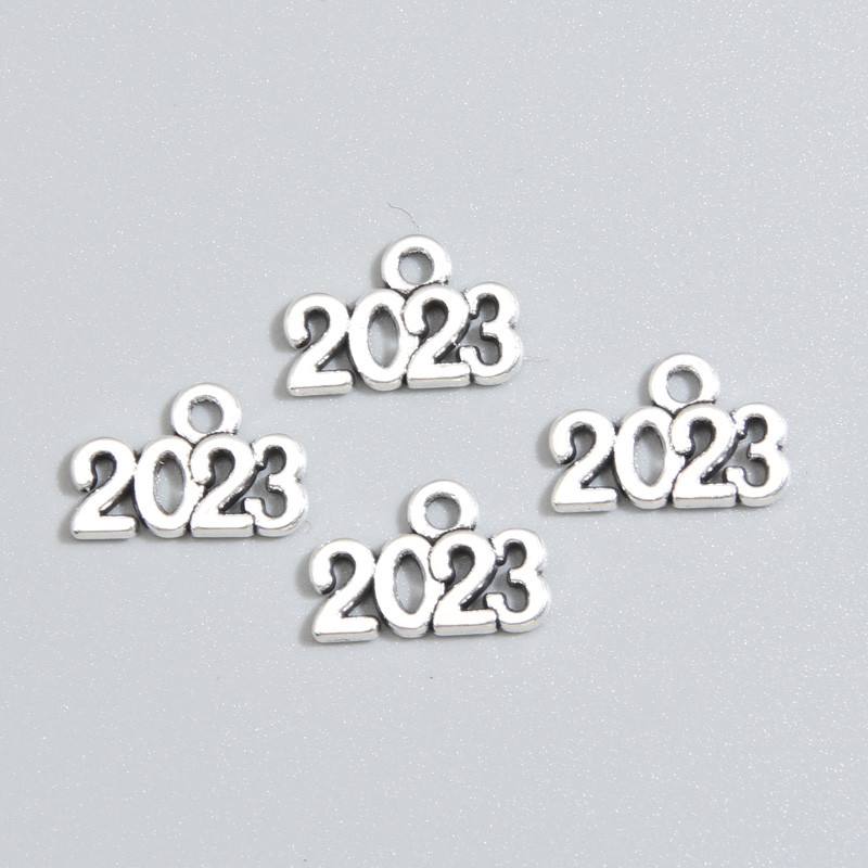 100db Dupla színű 14x9mm szám 2023 év Charms betűs medál barkácsoláshoz kézzel készített fémötvözet ékszerkészítési kiegészítő