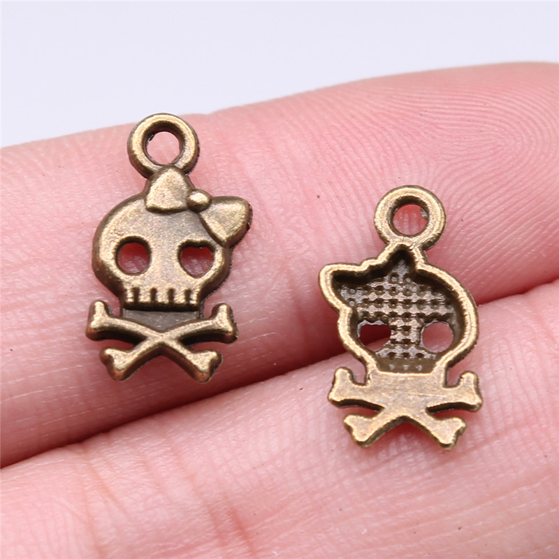 WYSIWYG 40 de bucăți 16x9mm de culoare argintie antică Brelocuri cu arc de craniu Brelocuri drăguțe cu cap de craniu pentru realizarea de bijuterii DIY pentru brățară colier