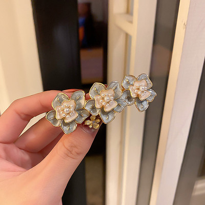 Noua versiune coreeană a perlelor camelie clemă de păr de primăvară clemă retro cu margine de cristal clemă laterală accesorii de păr casual de modă feminină