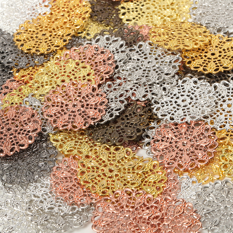 20 tk/partii 25 mm lilled filigraansed ümbrised õõnsad paabulinnu sulgedega ühendused. 