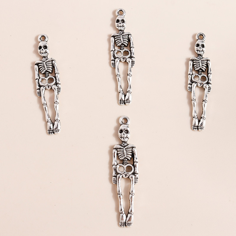 20vnt 9*39mm Helovino skeleto pakabukai kaklo papuošalams auskarams gaminti aksesuarai kaukolės pakabukai, skirti pasidaryk pats papuošalams gaminti