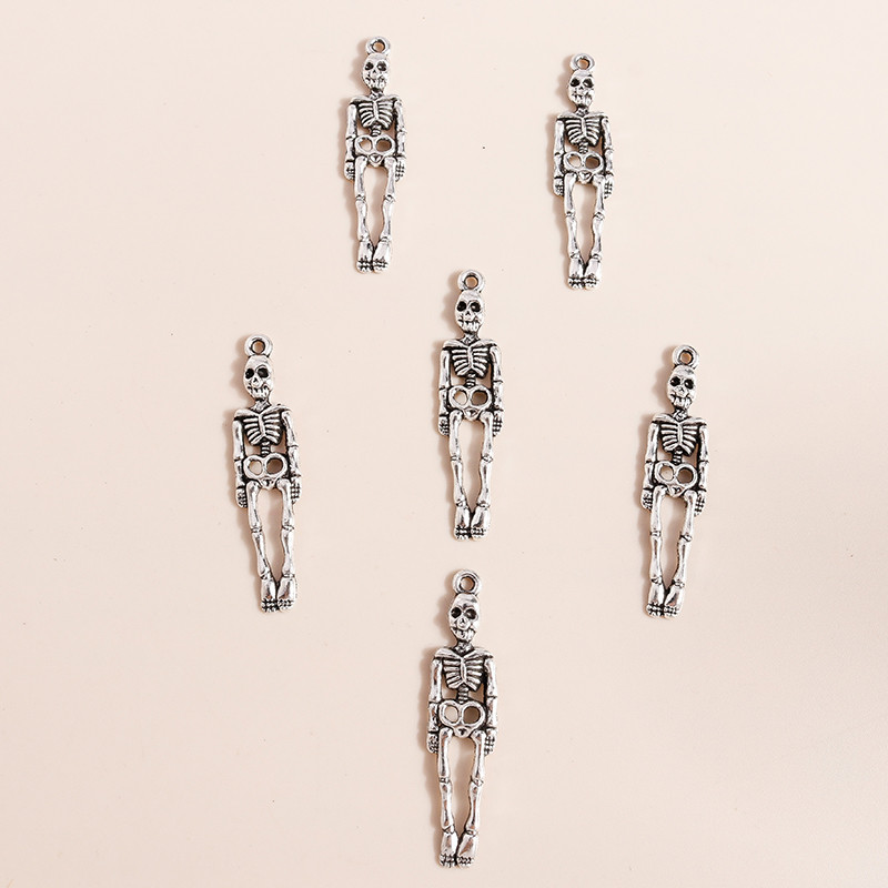 20vnt 9*39mm Helovino skeleto pakabukai kaklo papuošalams auskarams gaminti aksesuarai kaukolės pakabukai, skirti pasidaryk pats papuošalams gaminti