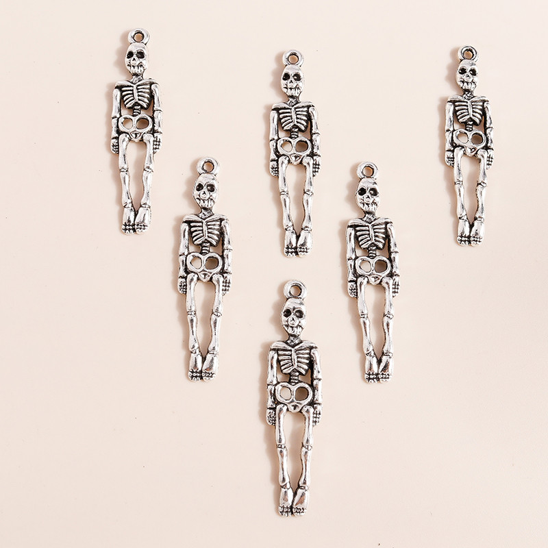 20vnt 9*39mm Helovino skeleto pakabukai kaklo papuošalams auskarams gaminti aksesuarai kaukolės pakabukai, skirti pasidaryk pats papuošalams gaminti
