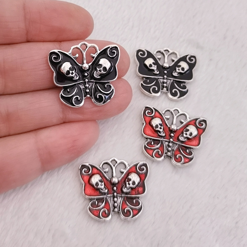 10 db Enamel Butterflies Skulls charm Charm Black Skull Butterfly Pendant Fülbevaló Nyaklánc Ékszer Barkácsolás Ékszer Leletek