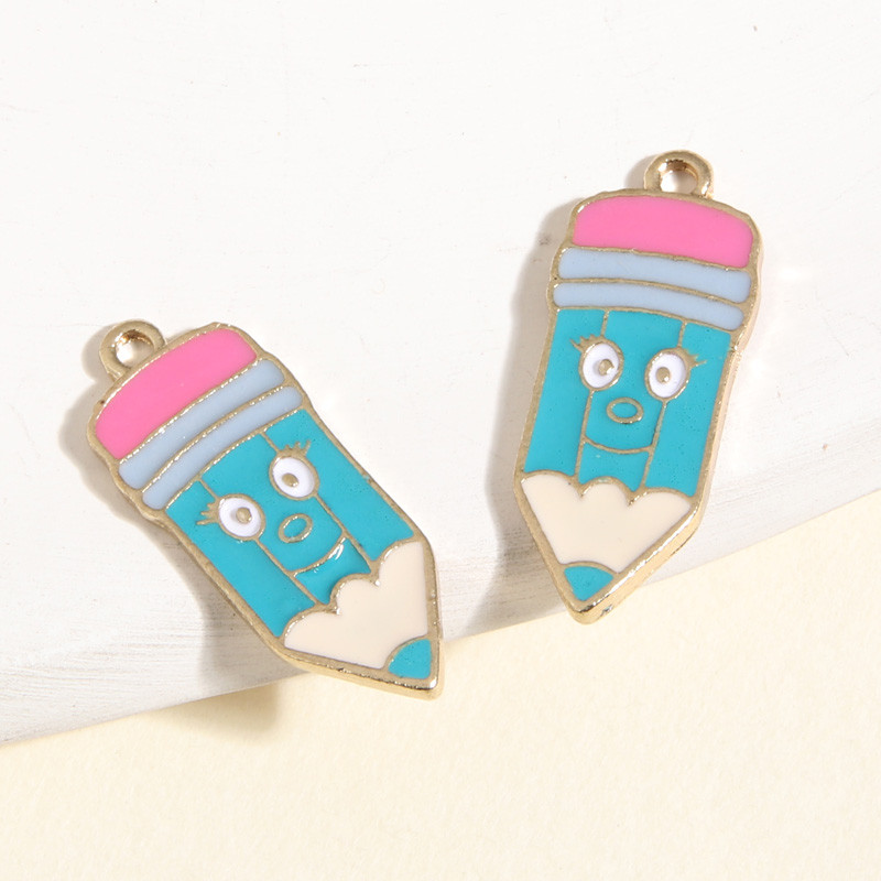 10 vnt. aukso spalvos 24x10 mm animacinių filmų emalio pieštukų pakabukai kreidelės pakabukas, tinkantis „pasidaryk pats“ kaklo papuošalai, rankų darbo priedai