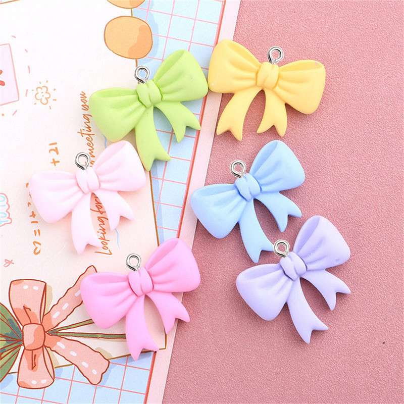 10Pcs Kawaii Bowknot Resin Charms Naušnica Ogrlica u obliku ušice DIY slatki privjesci Privjesak za ključeve Dodaci za kosu Modni nakit