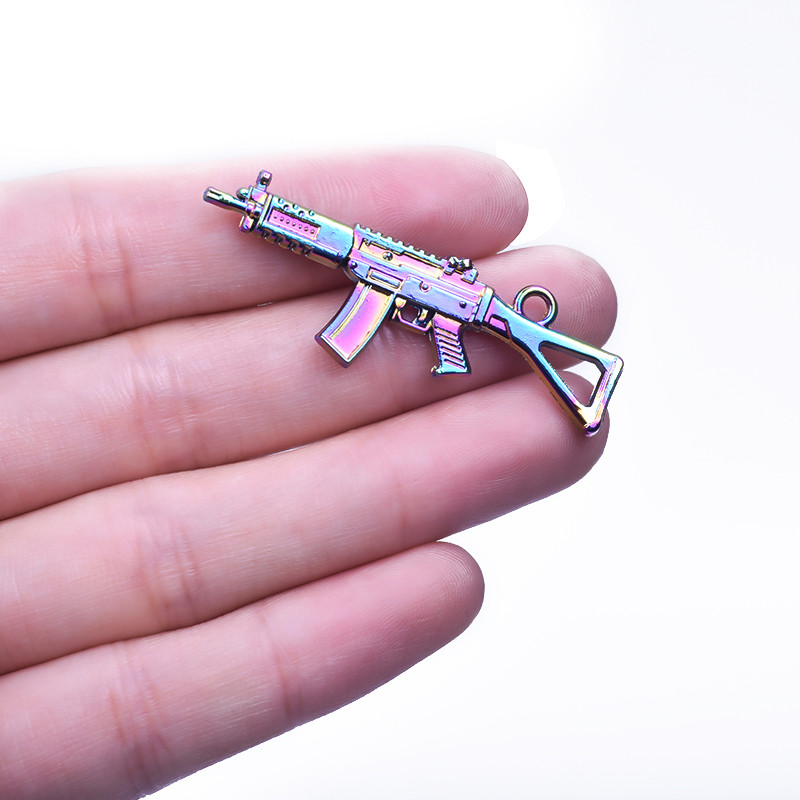 5db/tétel Gun Rainbow Color Charms ékszertáska fülbevaló medál