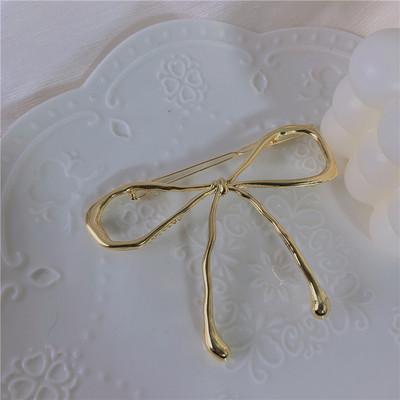 INS Hot Simple Bowknot Hajtű Arany Színű Fém Hollow Barrettes Eredeti Elegáns Hajtartozékok Hátsó Hajcsat Ékszer Ajándék
