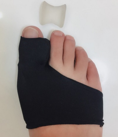 1 pár Bunion Corrector Gel Pad Stretch Nylon Hallux Valgus Protector Guard Toe Separator Ortopéd Protector New Hot