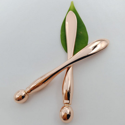 Metalo lydinio paakių kremo lazdelė, veido kreminė kaukė, gręžianti šaukštą iš abiejų galų, švino nuo raukšlių masažo lazdelės makiažo šaukštelio priemonė