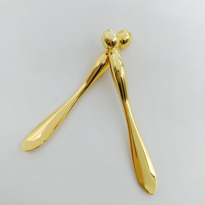 Metalo lydinio paakių kremo lazdelė, veido kreminė kaukė, gręžianti šaukštą iš abiejų galų, švino nuo raukšlių masažo lazdelės makiažo šaukštelio priemonė