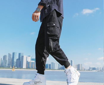 Модерни мъжки ежедневни шалварести панталони с декоративни ципове и големи удобни джобове 