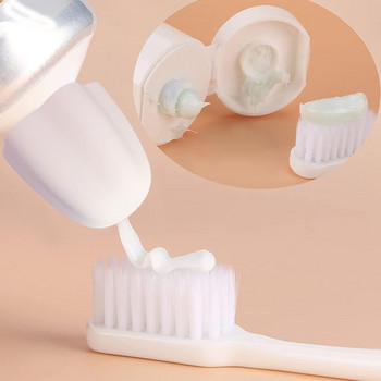 2 бр. Силиконова капачка за паста за зъби Самоуплътняваща се изстисквачка за паста за зъби Дозатор за помпа за паста за зъби Спестяваща паста за зъби Консумативи за баня