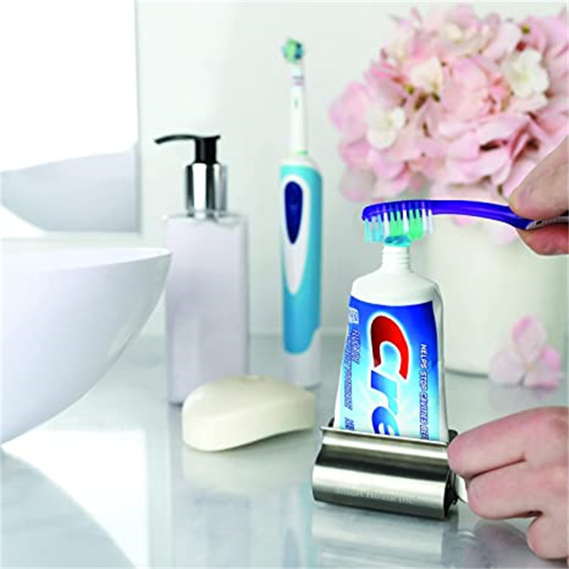 Аксесоари за баня Тръба за изстискване на паста за зъби Ролка от неръждаема стомана Изцеждаща ролка Въртящ се дозатор за мехлеми Козметика