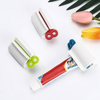 Εγχειρίδιο Convenient Toothpaste Rolling Toothpaste Tube Squeezer Βάση βάσης οδοντόκρεμας Αξεσουάρ μπάνιου
