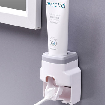 Изстискване на паста за зъби Висяща на стена стойка за четка за зъби Поставка Пластмасов държач Навиващ се автоматична преса за паста за зъби Аксесоари за баня