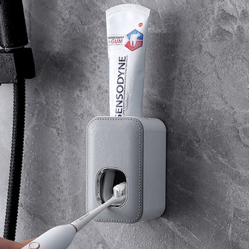 Διανομέας οδοντόκρεμας Αυτόματη βάση αξεσουάρ μπάνιου Στίφτης για τη σκόνη χωρίς τρυπητή βάση