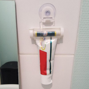 Πλαστική οδοντόκρεμα Διανομέας οδοντόκρεμας Ρολόι στίφτης σωλήνας οδοντιατρική κρέμα μπάνιου Εγχειρίδιο σύριγγα πιστολιού κρεμαστή