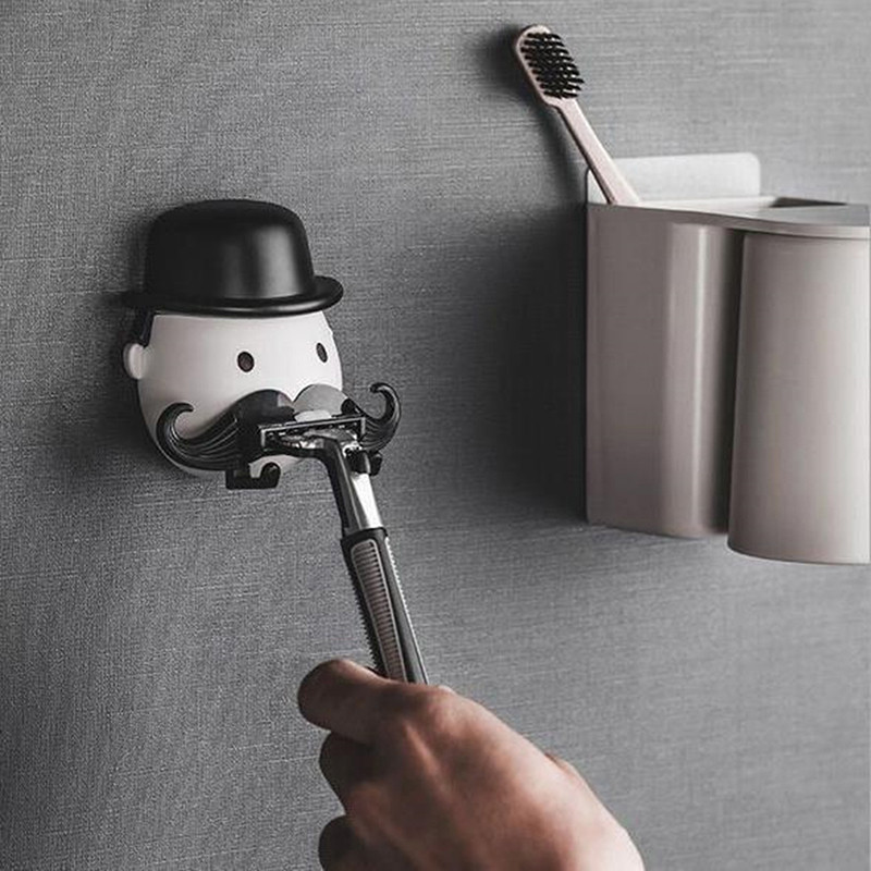 Ūso formos plastikinis skustuvo laikiklis Vonios kambarys Prausyklos sieninis siurblys Skustuvas Barzdos skustuvas Organizatorius Siurbimo puodelio kabliukas