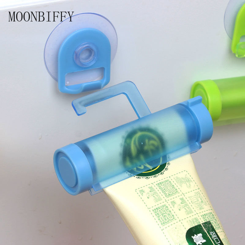 Седалка за паста за зъби Пластмасова подвижна тръба Изстисквачка Дозатор за паста за зъби Държач за смукател Тръба Висящ държач Инструмент за изстискване на баня