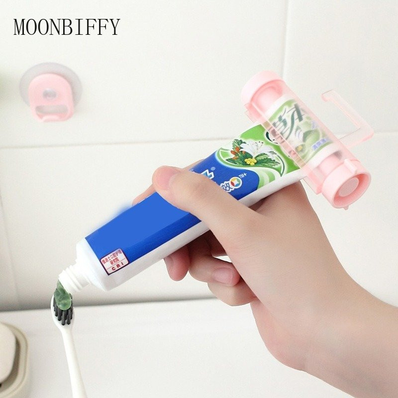 Седалка за паста за зъби Пластмасова подвижна тръба Изстисквачка Дозатор за паста за зъби Държач за смукател Тръба Висящ държач Инструмент за изстискване на баня