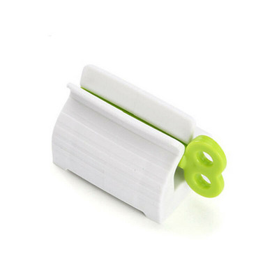 Творческа изстисквачка за паста за зъби Висяща търкаляща се преса Държач за паста за зъби Тръба за почистващ препарат за лице Ръчно изстискан дозатор Смукач