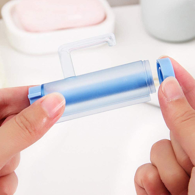 Творческа изстисквачка за паста за зъби Висяща търкаляща се преса Държач за паста за зъби Тръба за почистващ препарат за лице Ръчно изстискан дозатор Смукач