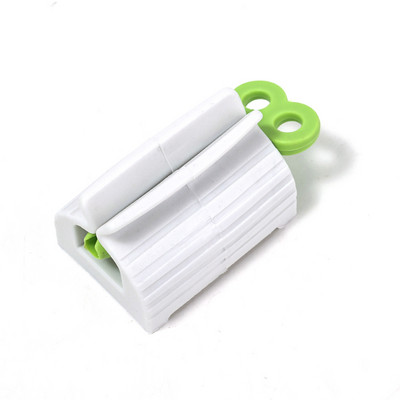 Pārnēsājams zobu pastas spiedes dozators Daudzfunkcionāls zobu pastas turētājs Sejas tīrīšanas līdzekļa tūbiņu klipši Vannas istabas piederumi Izejmateriāli