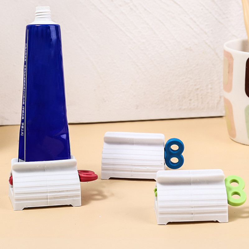 Pārnēsājams zobu pastas spiedes dozators Daudzfunkcionāls zobu pastas turētājs Sejas tīrīšanas līdzekļa tūbiņu klipši Vannas istabas piederumi Izejmateriāli